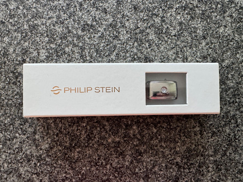 Neu und verpackt - verpackt, stein